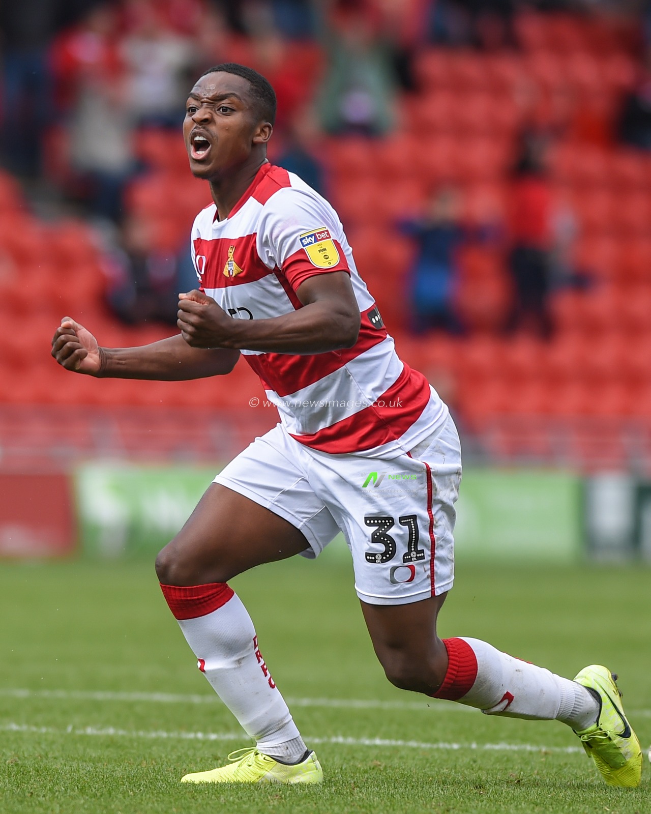 7th September 2019, Keepmoat Stadium, Doncaster, England; Sky Bet League One Football, Doncaster Rovers vs Rotherham United ; Niall Ennis (31) of Doncaster Rovers of celebrates winnning a penalty.
Credit: Dean Williams/News Images

English Football League images are subject to DataCo Licence
