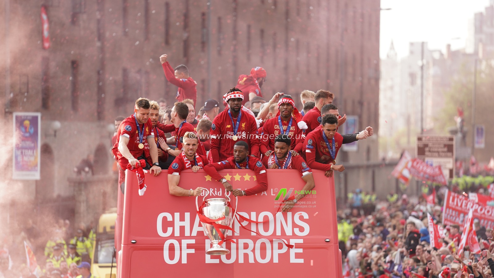 Liverpool Football club Champions League parade through the city on an open top bus.

2nd June 2019 , Liverpool, England; UEFA Champions League, Liverpool FC Champions League winners celebrations and open top bus parade ; 


Credit: Terry Donnelly/News Images