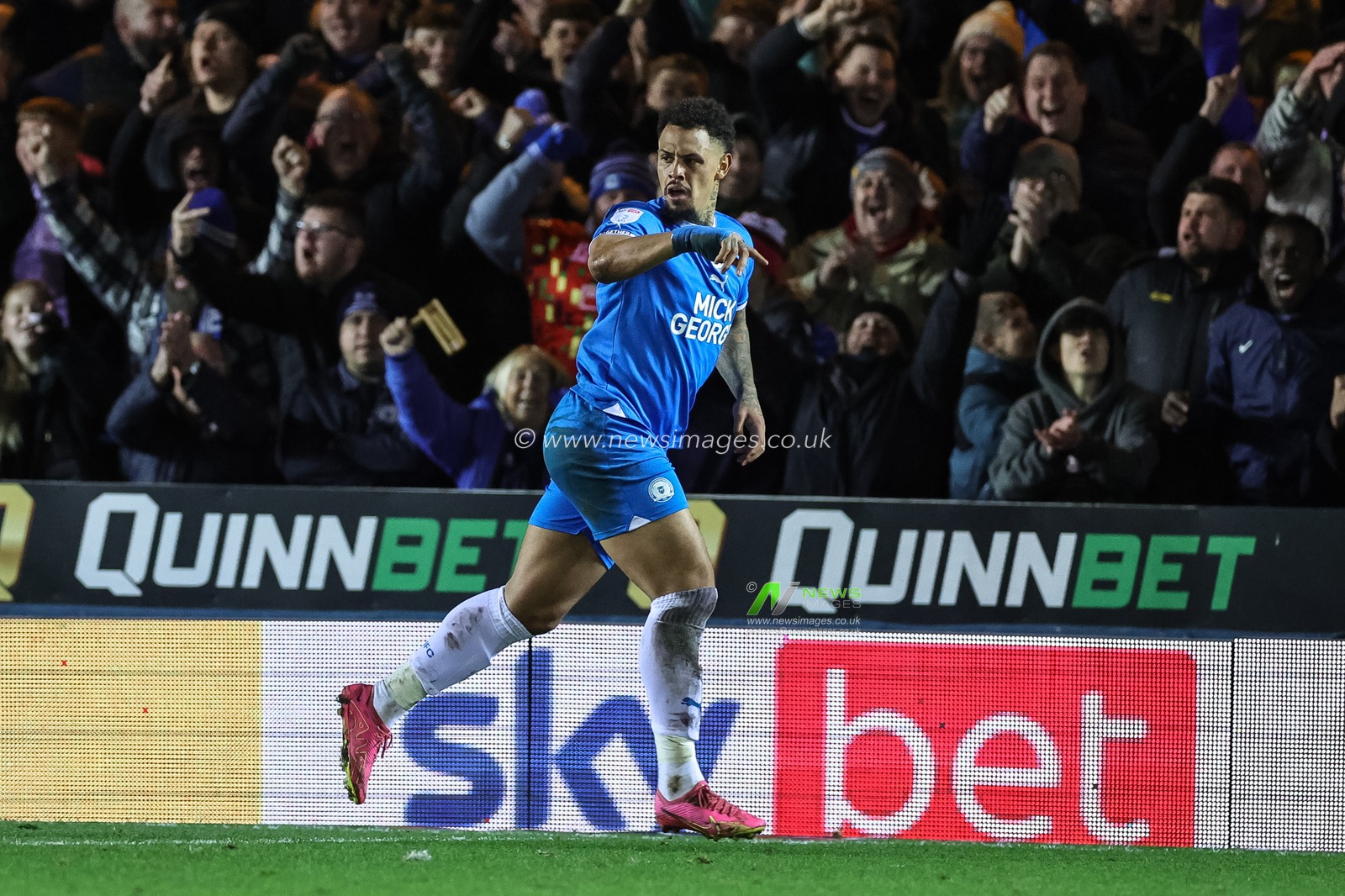 Jonson Clarke-Harris #9 of Peterborough United celebrates his goal to make it 2-2 during the Sky Bet League 1 match Peterborough United vs Barnsley at Weston Homes Stadium, Peterborough, United Kingdom, 29th December 2023

(Photo by Mark Cosgrove/News Images)