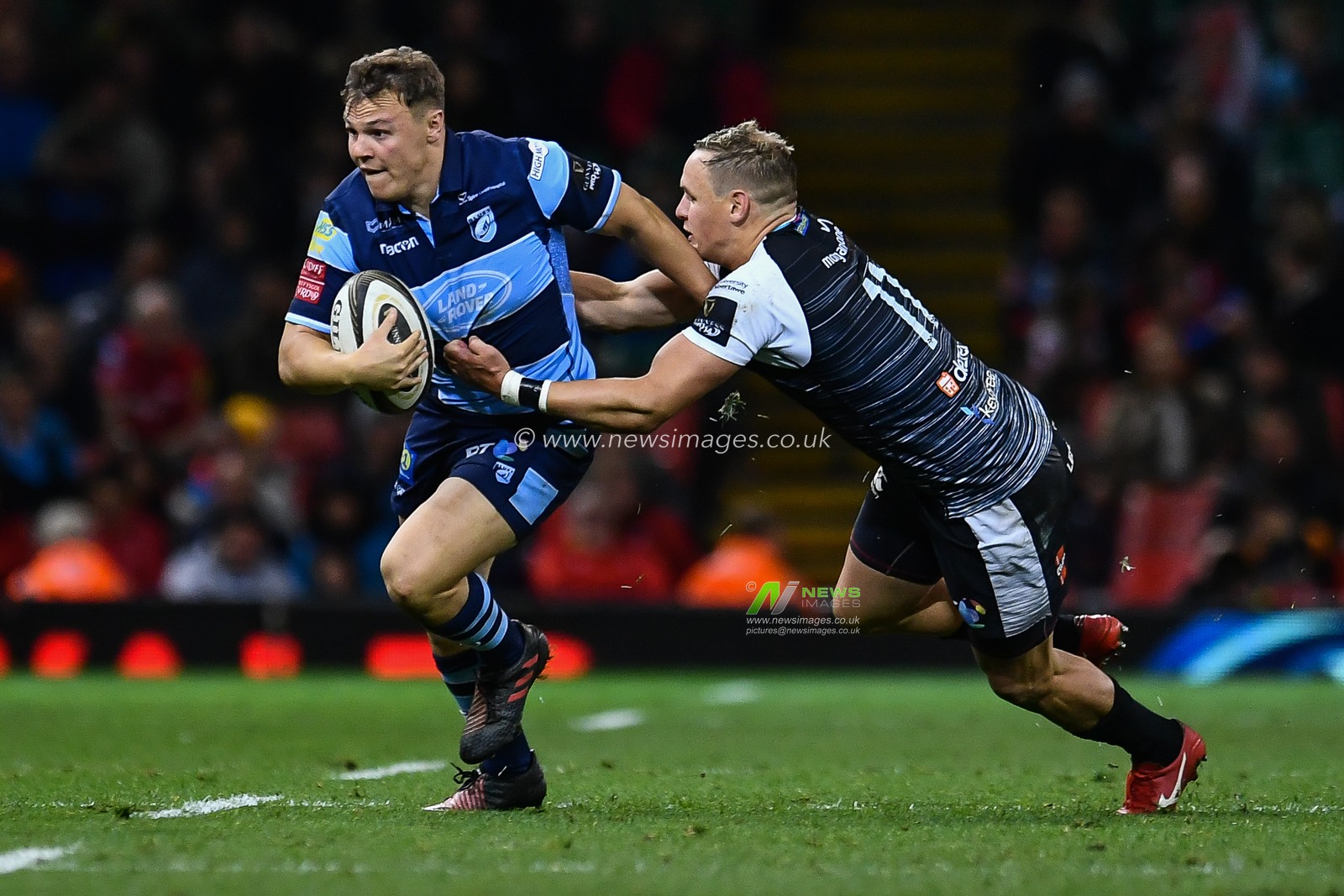 27th April 2019 , Principality Stadium , Cardiff, Wales ; Guinness pro 14â€™s, Round 21, Cardiff Blues Vs Ospreys ; Jarrod Evans of Cardiff Blues is tackled by Hanno Dirksen of Ospreys

Credit:  Craig Thomas/News Images