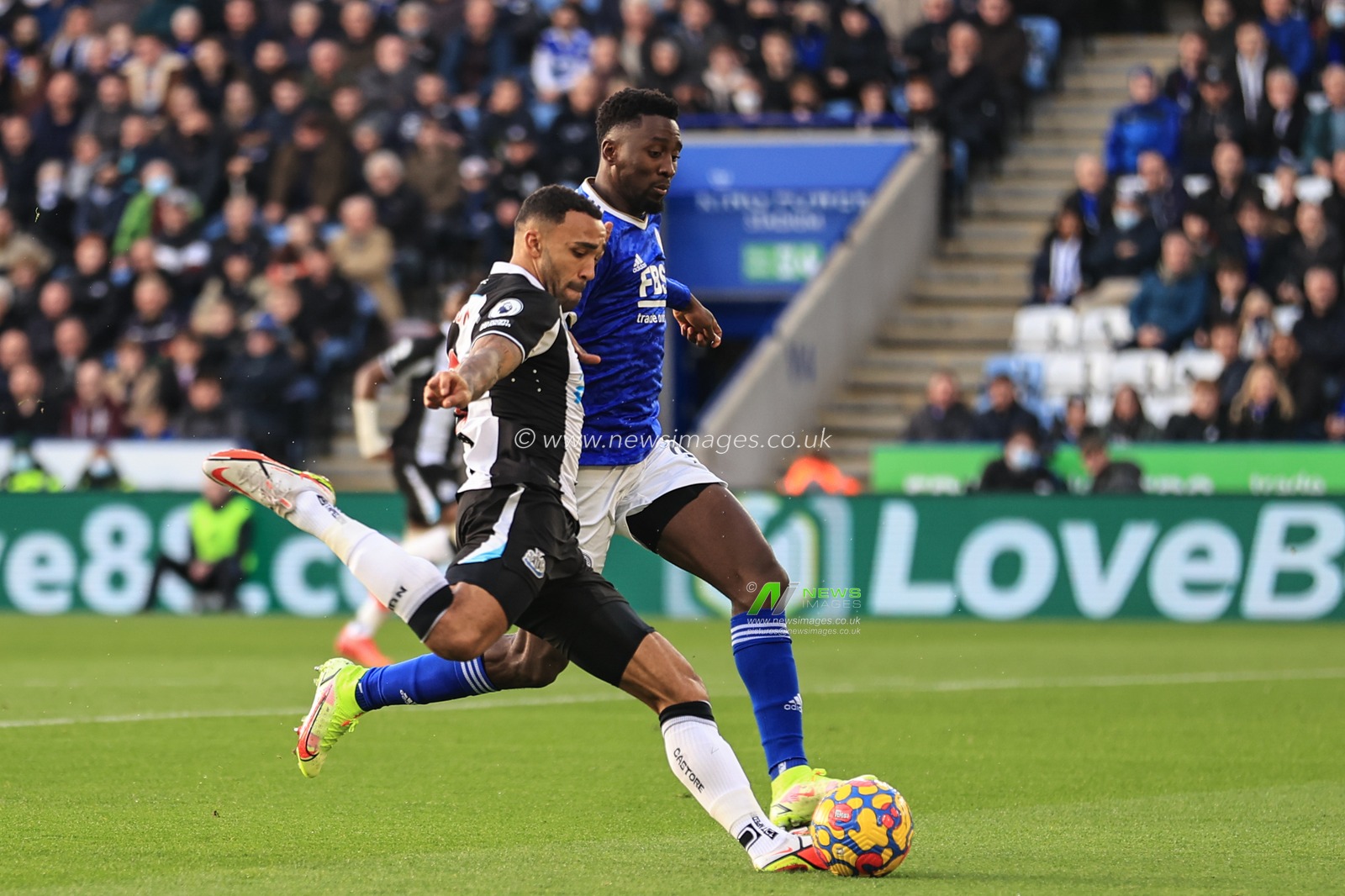 Callum Wilson #9 of Newcastle United crosses the ball
