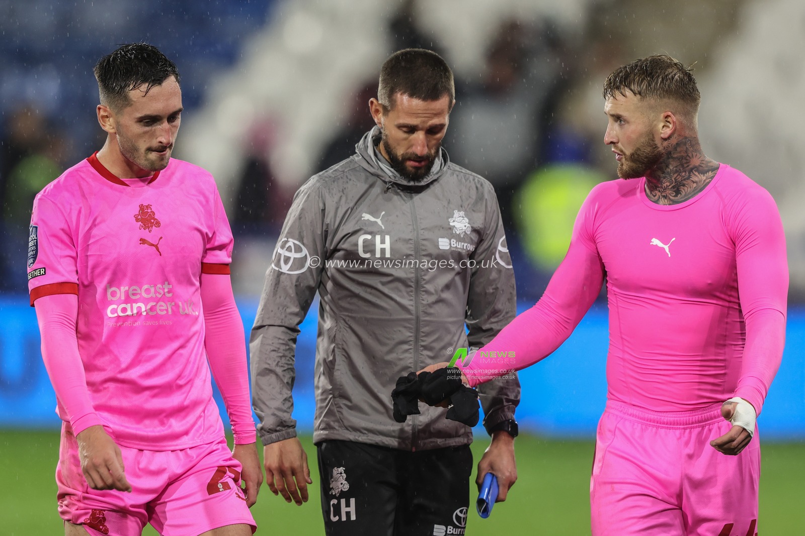 Conor McCarthy of Barnsley, Conor Hourihane of Barnsley and Stephen Humphrys of Barnsley after the game during the Bristol Street Motors Trophy match Huddersfield Town vs Barnsley at John Smith's Stadium, Huddersfield, United Kingdom, 8th October 2024

(Photo by Alfie Cosgrove/News Images)