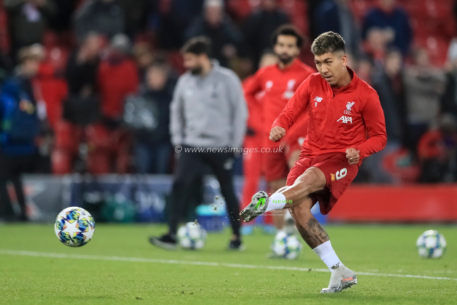 27th November 2019, Anfield, Liverpool, England; UEFA Champions League, Liverpool v Napoli : Roberto Firmino (9) of Liverpool warms up 

Credit: Mark Cosgrove/News Images