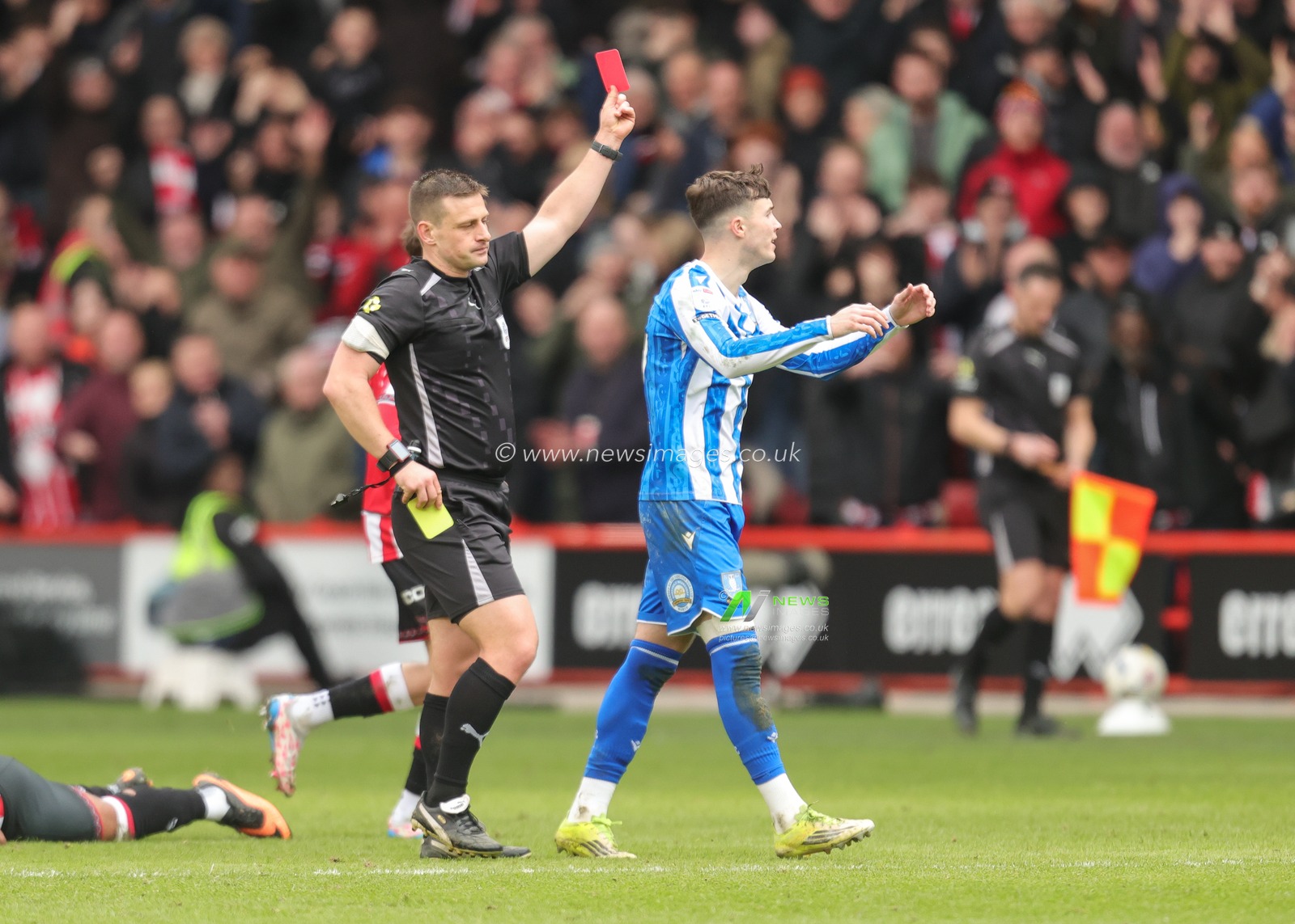 Gabriel Otegbayo of Sheffield Wednesday  is given a red car and sent off after receiving a second yellow card during the Sky Bet Championship match Sheffield United vs Sheffield Wednesday at Bramall Lane, Sheffield, United Kingdom on 22 February 2026

(Photo by Richard Bierton/News Images)