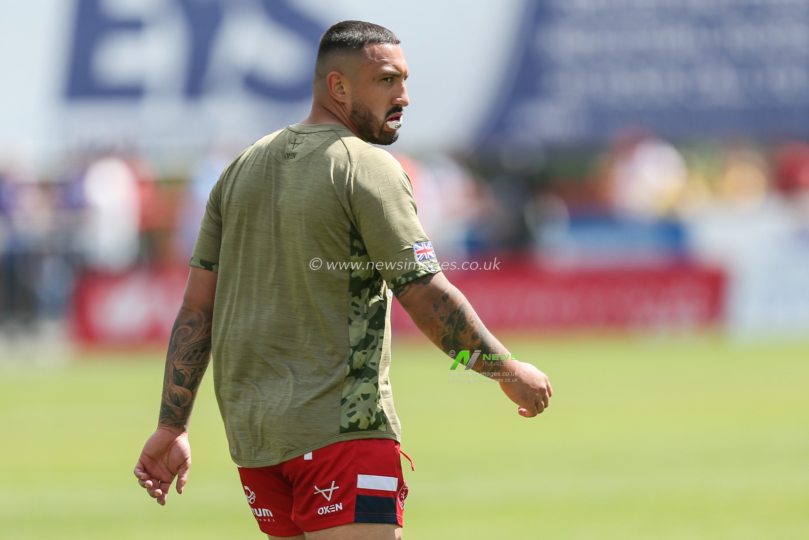 Elliot Minchella #17 of Hull KR during pre-game warm up with a special armed forces day top