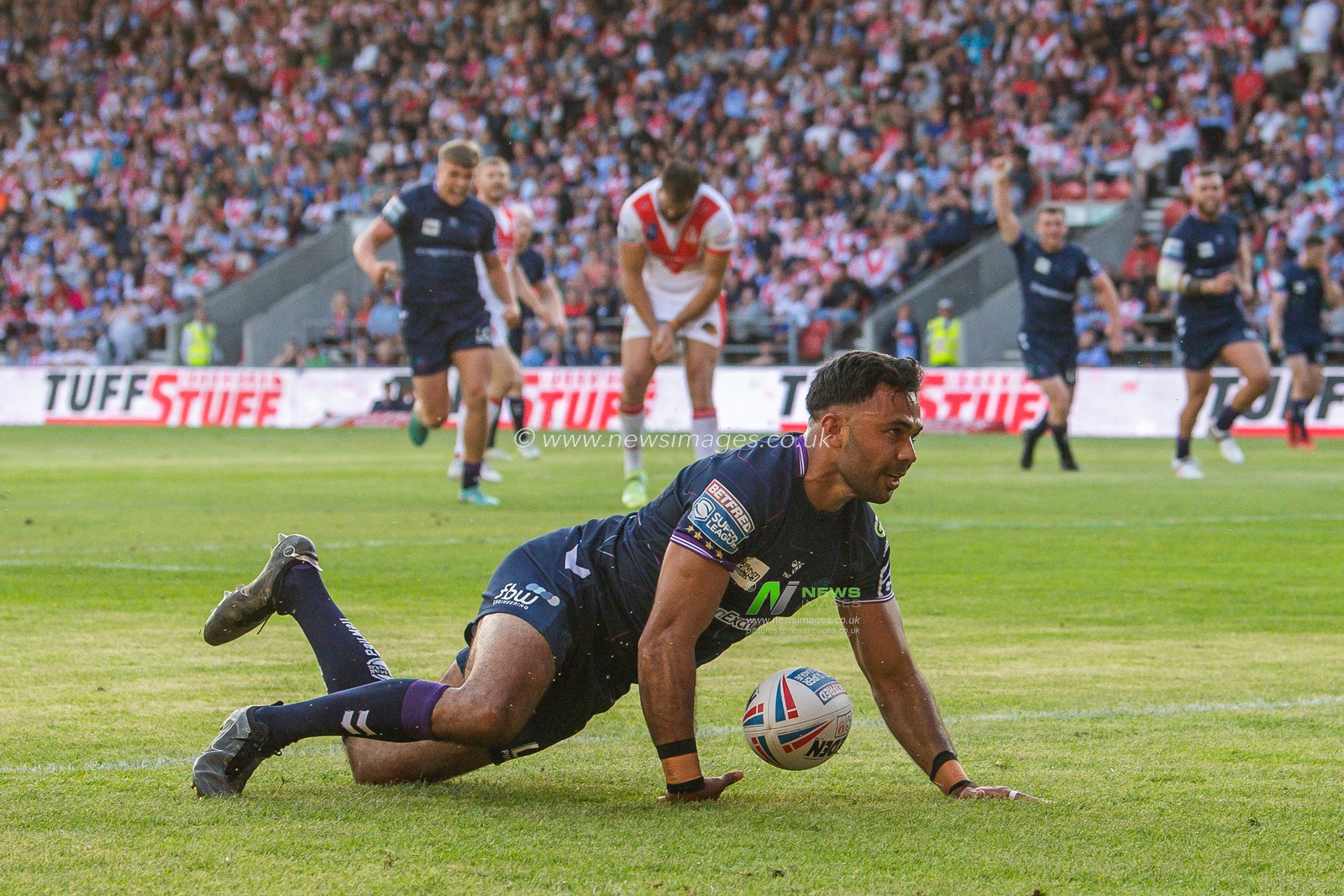 Bevan French #2 of Wigan Warriors celebrates his try during the Betfred Super League Round 15 match St Helens vs Wigan Warriors at Totally Wicked Stadium, St Helens, United Kingdom, 9th June 2023

(Photo by Craig Thomas/News Images)