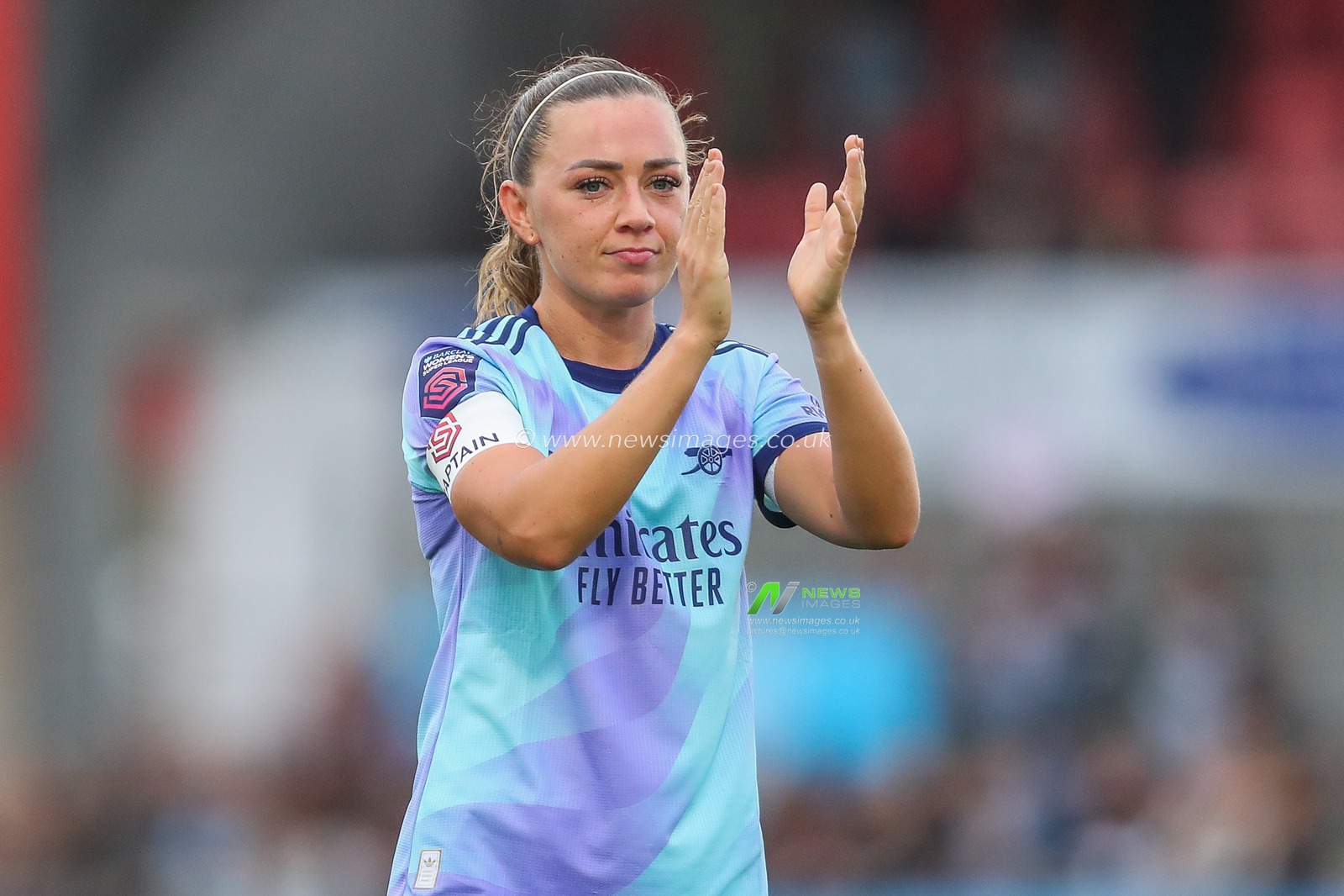 Katie McCabe of Arsenal acknowledges the fans after the teams victory following the Barclays Women's Super League match West Ham United Women vs Arsenal Women at Chigwell Construction Stadium, Dagenham, United Kingdom, 20th October 2024

(Photo by Izzy Poles/News Images)