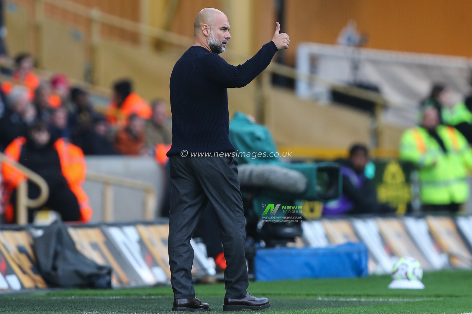 Pep Guardiola manager of Manchester City gives the thumbs up during the Premier League match Wolverhampton Wanderers vs Manchester City at Molineux, Wolverhampton, United Kingdom, 20th October 2024

(Photo by Gareth Evans/News Images)