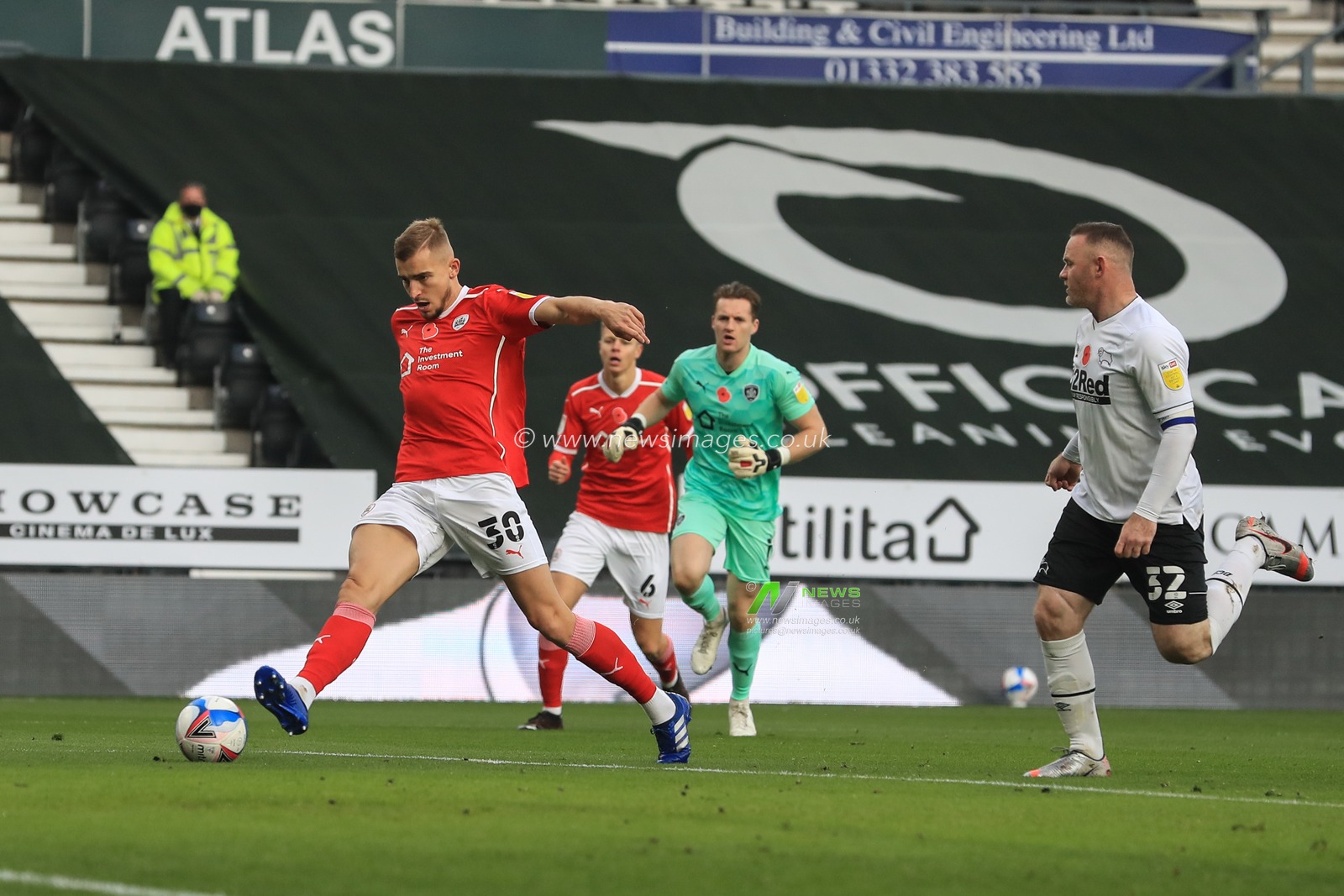 Michal Helik #30 of Barnsley puts the ball out for a corner