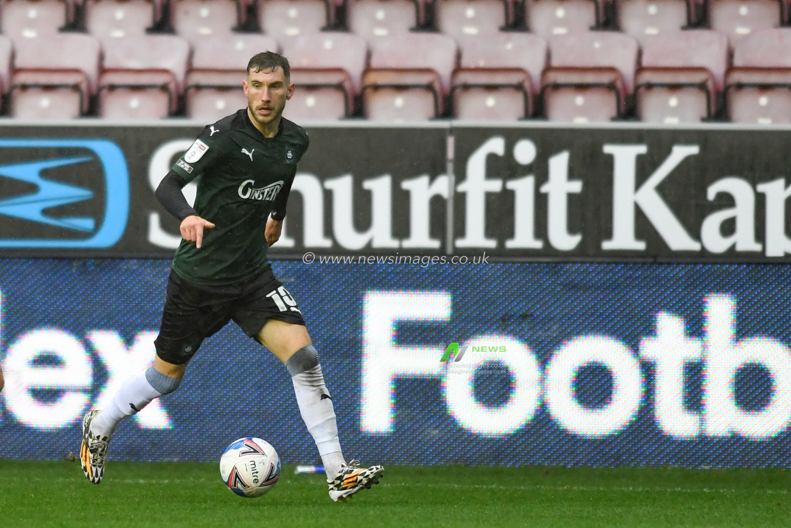 Danny Mayor (10) of Plymouth Argyle runs forward with the ball
