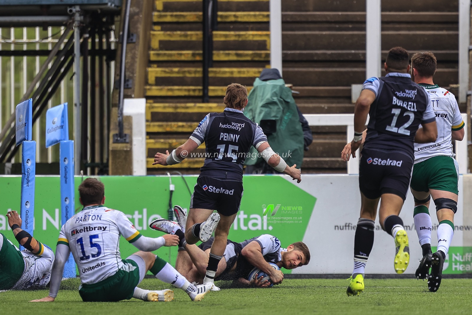 Ben Stevenson of Newcastle Falcons goes over for a try