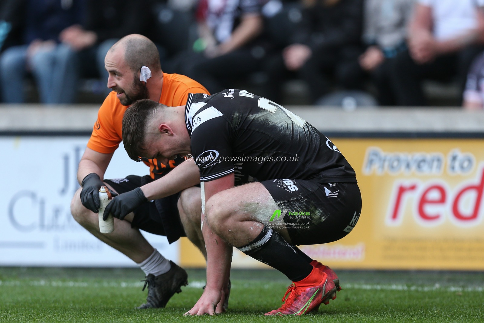 Connor Wynne #23 of Hull FC takes a breather after scoring his third try