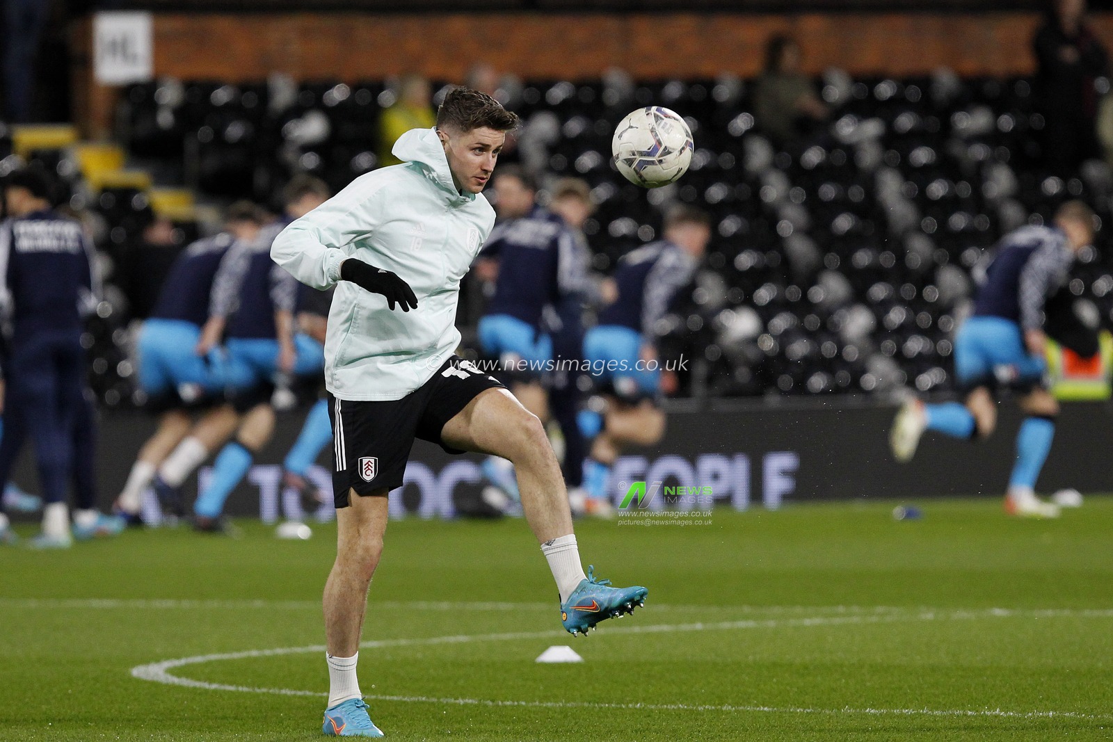 Tom Cairney #10 of Fulham warming up.