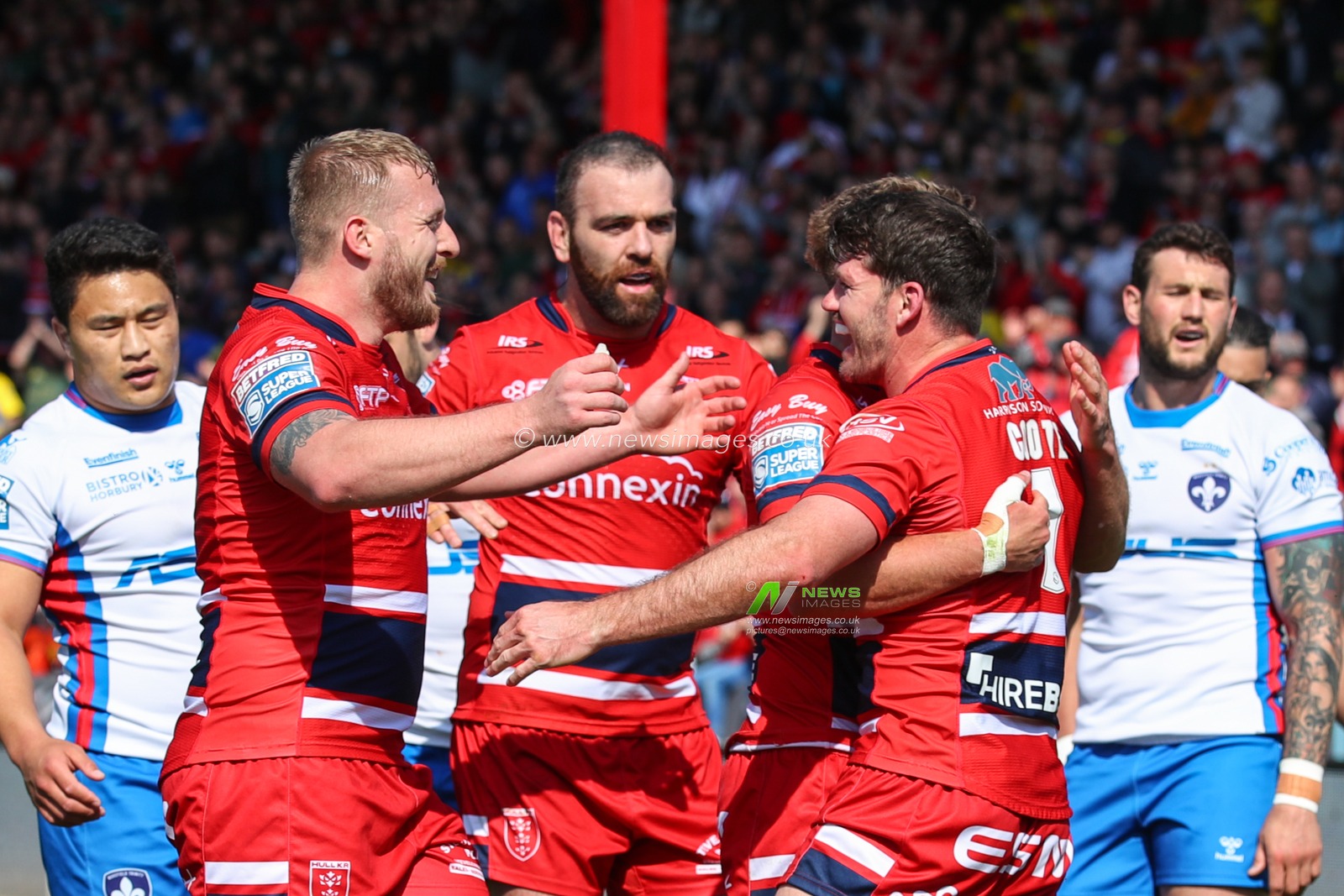 Lachlan Coote #1 of Hull KR celebrates his try