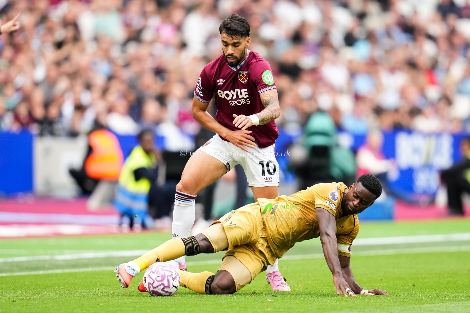 Lucas Paqueta of West Ham United takes down Marc Guehi of Crystal Palace during the Premier League match West Ham United vs Crystal Palace at London Stadium, London, United Kingdom, 20th September 2025

(Photo by Harvey Murphy/News Images)