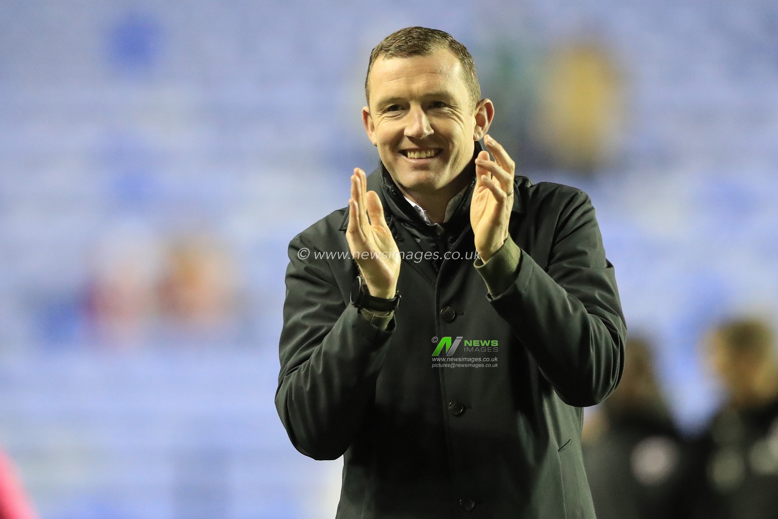 Neill Collins Head coach of Barnsley applauds the travelling fans after a 1-3 win during the Sky Bet League 1 match Reading vs Barnsley at Select Car Leasing Stadium, Reading, United Kingdom, 9th December 2023

(Photo by Alfie Cosgrove/News Images)