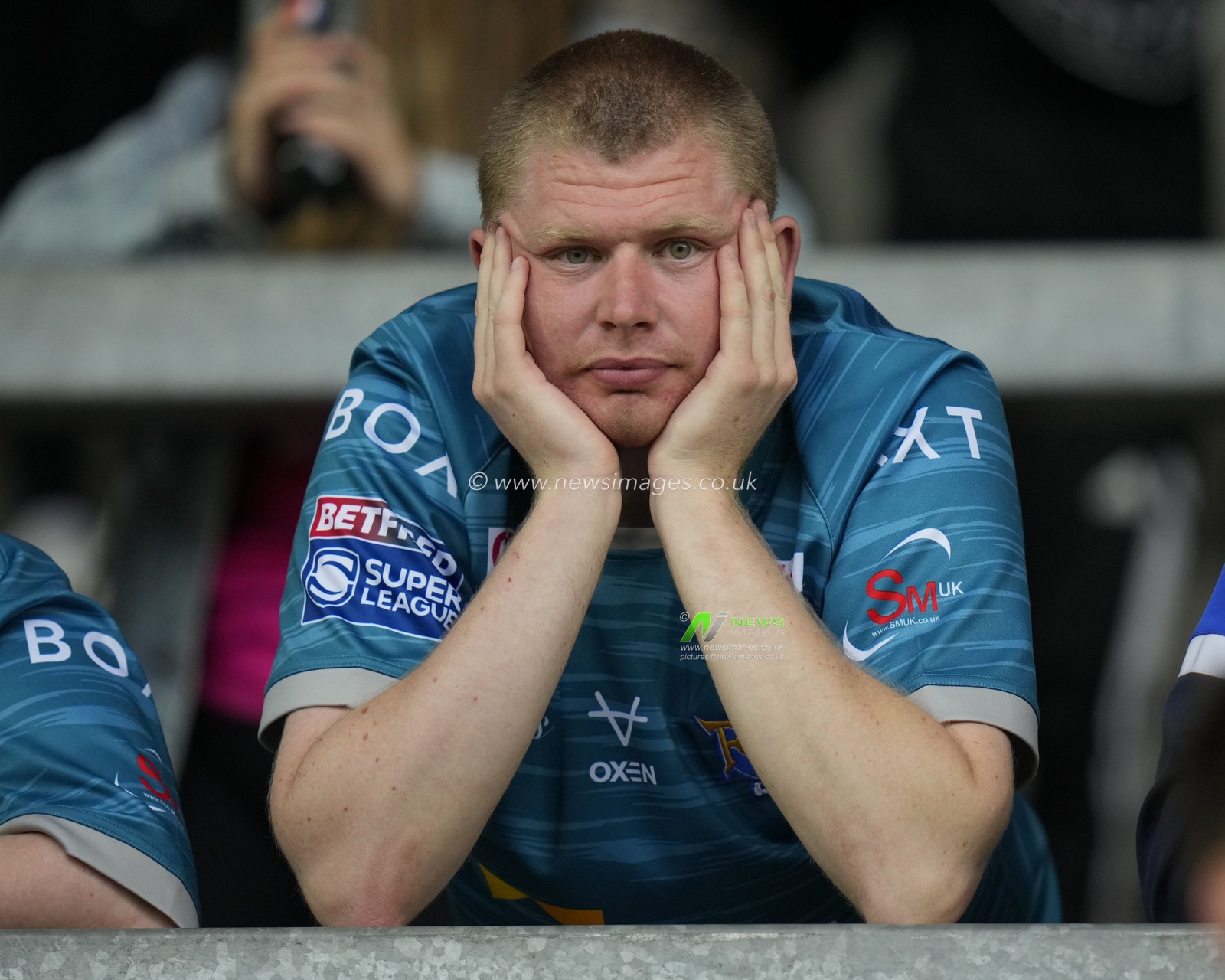 A Leeds Rhinos fan waits for the sides to come out for the warm up before the Betfred Super League Round 20 match St Helens vs Leeds Rhinos at Totally Wicked Stadium, St Helens, United Kingdom, 28th July 2023

(Photo by Steve Flynn/News Images)