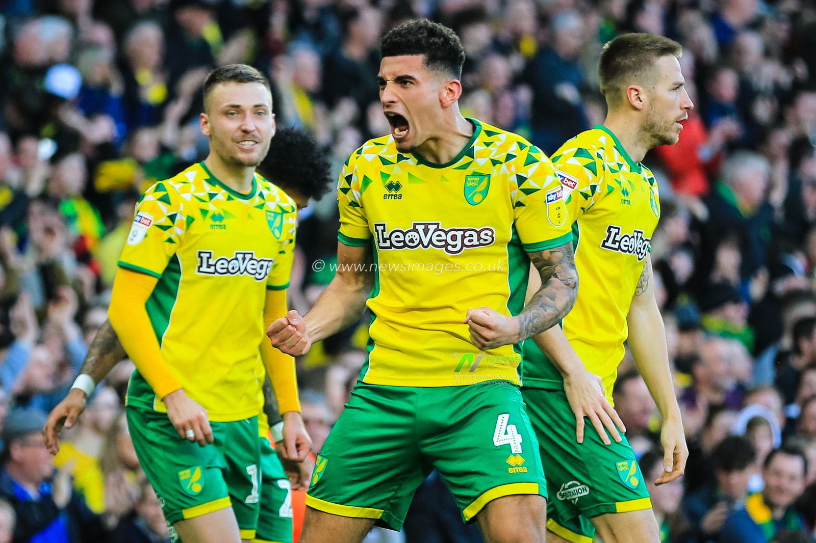 23rd February 2019, Carrow Road, Norfolk, England; Sky Bet Championship, Norwich City vs Bristol City ;  Ben Godfrey (04) of Norwich City celebrates levelling the scores at 2-2.

Credit: Georgie Kerr/News Images

English Football League images are subject to DataCo Licence