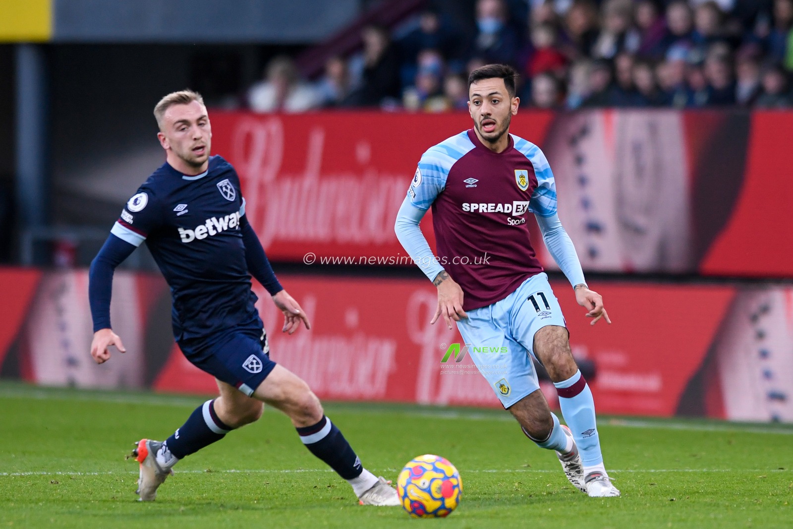 Dwight McNeil #11 of Burnley starts an attacking move
