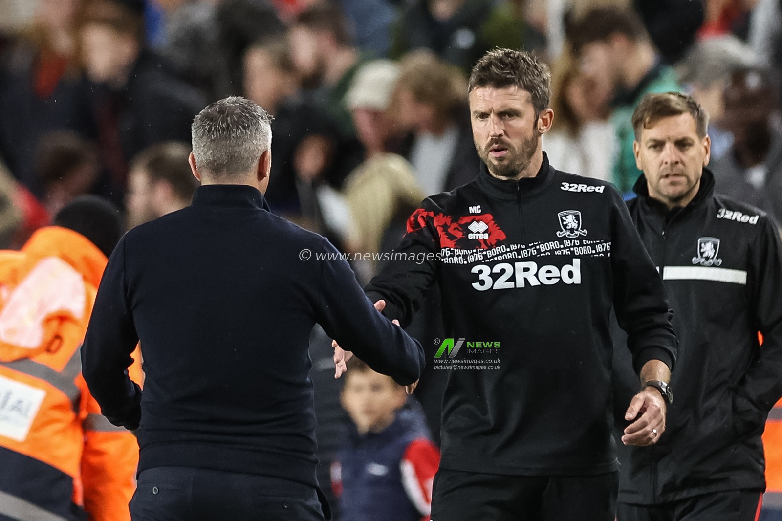 A dejected Michael Carrick manger of Middlesbrough shakes hands with Steven Schumacher manager of Stoke City after losing 0-5 during the Carabao Cup match Middlesbrough vs Stoke City at Riverside Stadium, Middlesbrough, United Kingdom, 27th August 2024

(Photo by Mark Cosgrove/News Images)