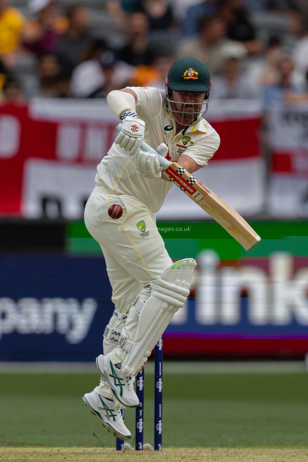 Travis Head of Australia plays a defensive shot during the NRMA Insurance Ashes First Test Day 2 Australia vs England at Optus Stadium, Perth, Australia, 22nd November 2025

(Photo by Santanu Banik/News Images)

*** GER AUT SUI OUT ***