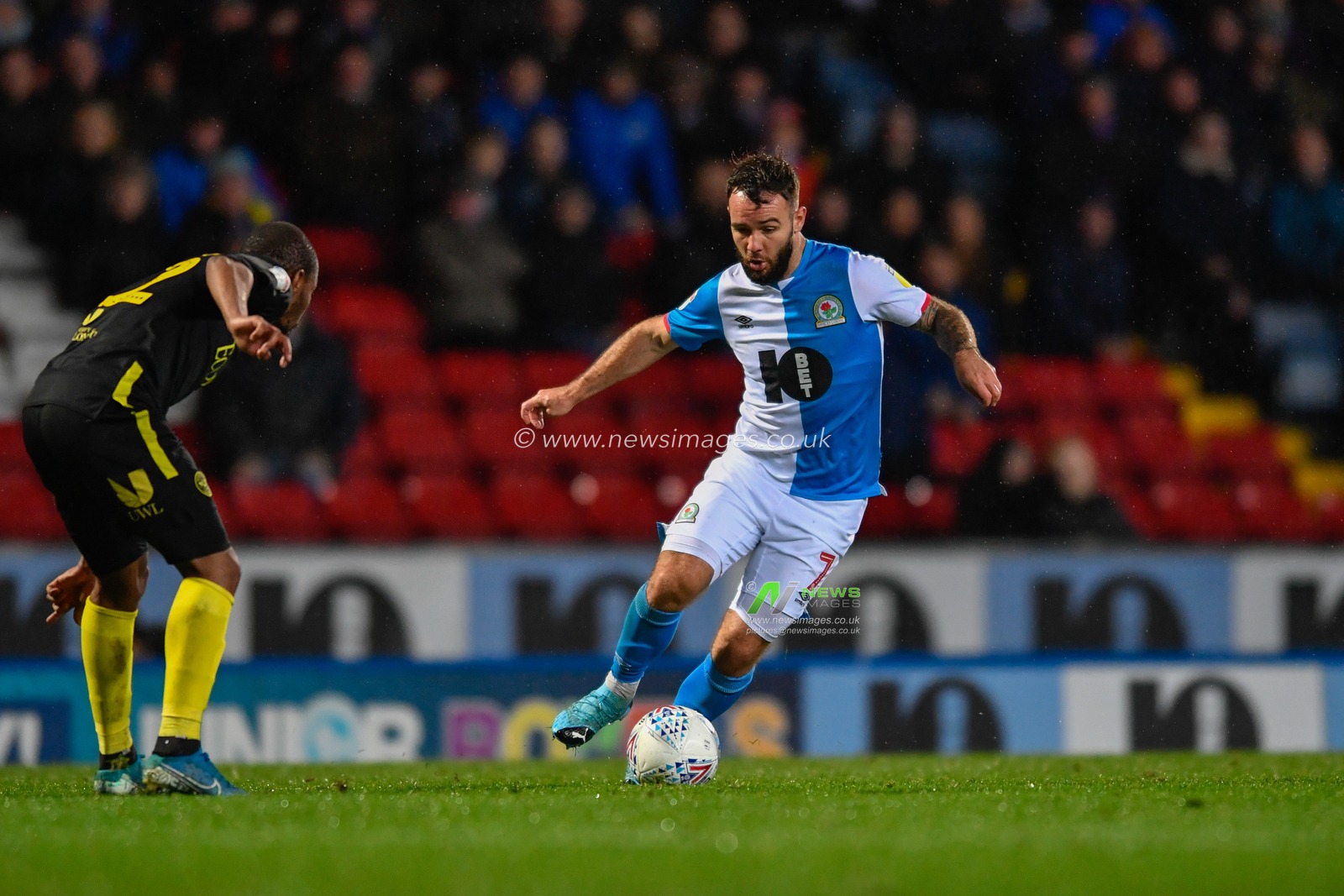 27th November 2019, Ewood Park, Blackburn, England; Sky Bet Championship, Blackburn Rovers v Brentford : Adam Armstrong (7) of Blackburn Rovers takes on a Brentford defender

Credit: Simon Whitehead/News Images