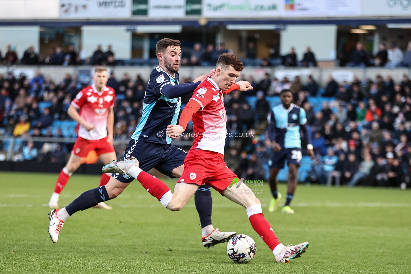 Conor Grant of Barnsley scores to make it 2-4 during the Sky Bet League 1 match Wycombe Wanderers vs Barnsley at Adams Park, High Wycombe, United Kingdom, 2nd March 2024

(Photo by Mark Cosgrove/News Images)
