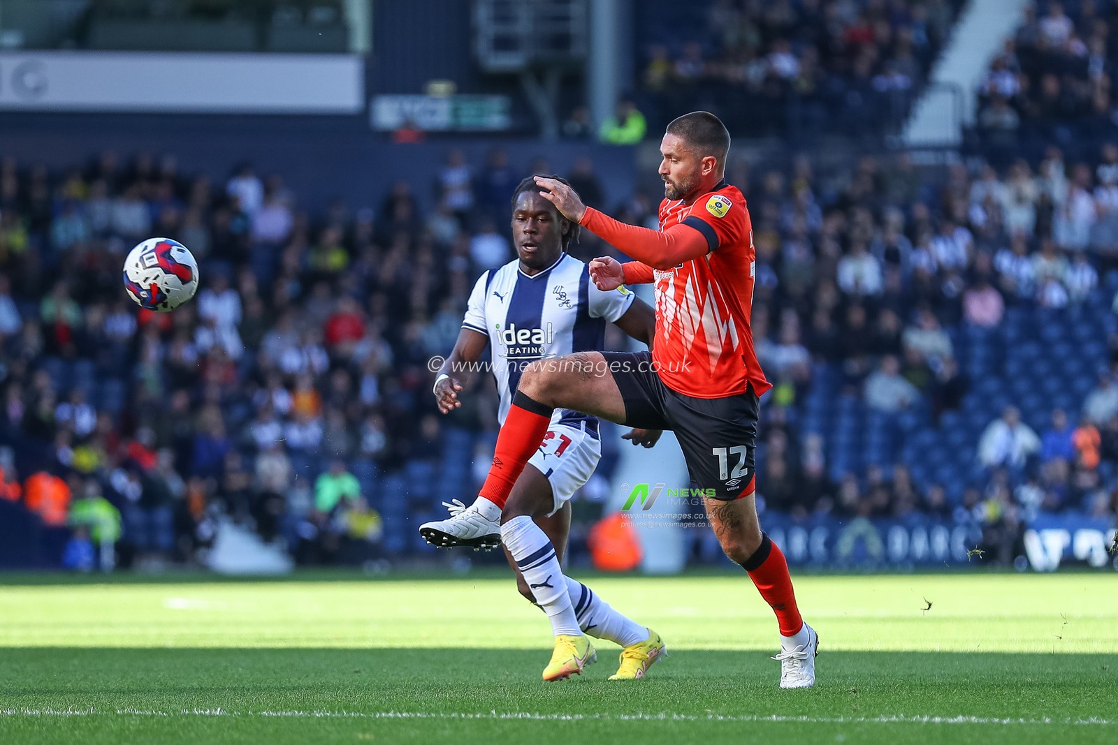 Henri Lansbury #12 of Luton Town flicks the ball on during the Sky Bet Championship match West Bromwich Albion vs Luton Town at The Hawthorns, West Bromwich, United Kingdom, 8th October 2022

(Photo by Gareth Evans/News Images)