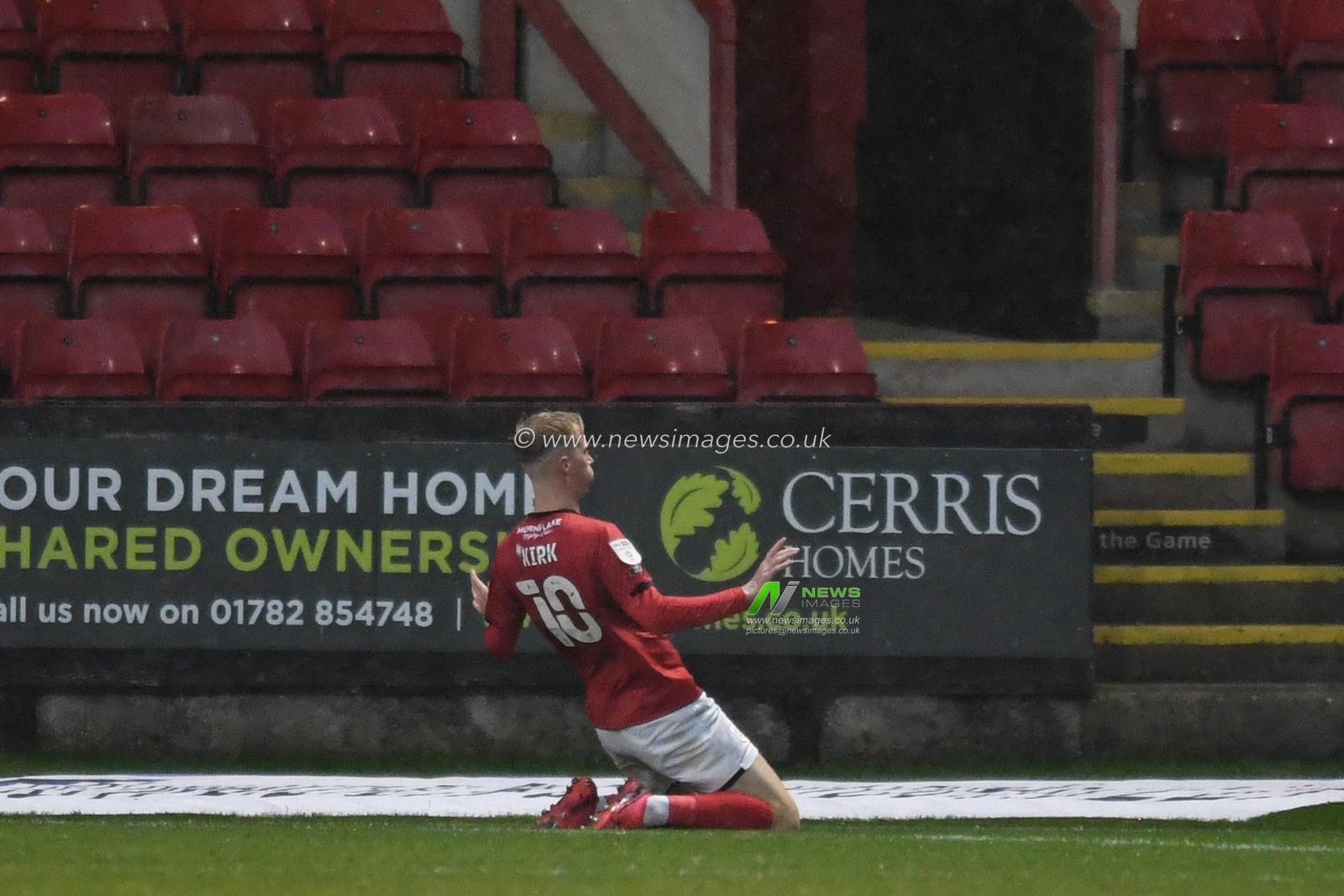 CELEBRATION Charlie Kirk #10 of Crewe Alexandra celebrates scoring a goal to make it 2-0