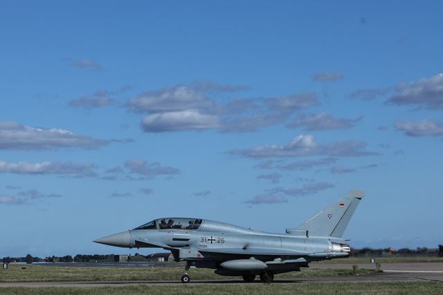 A German Air Force Eurofighter Typhoon FGR Mk4 pilot and engineer wave as it taxies back to the pan during a flight training day at RAF Coningsby, Coningsby, United Kingdom, 22nd September 2025

(Photo by Mark Cosgrove/News Images)