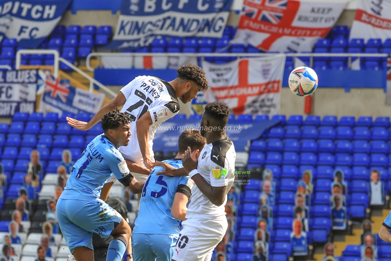 Romal Palmer #21 of Barnsley heads on goal, saved