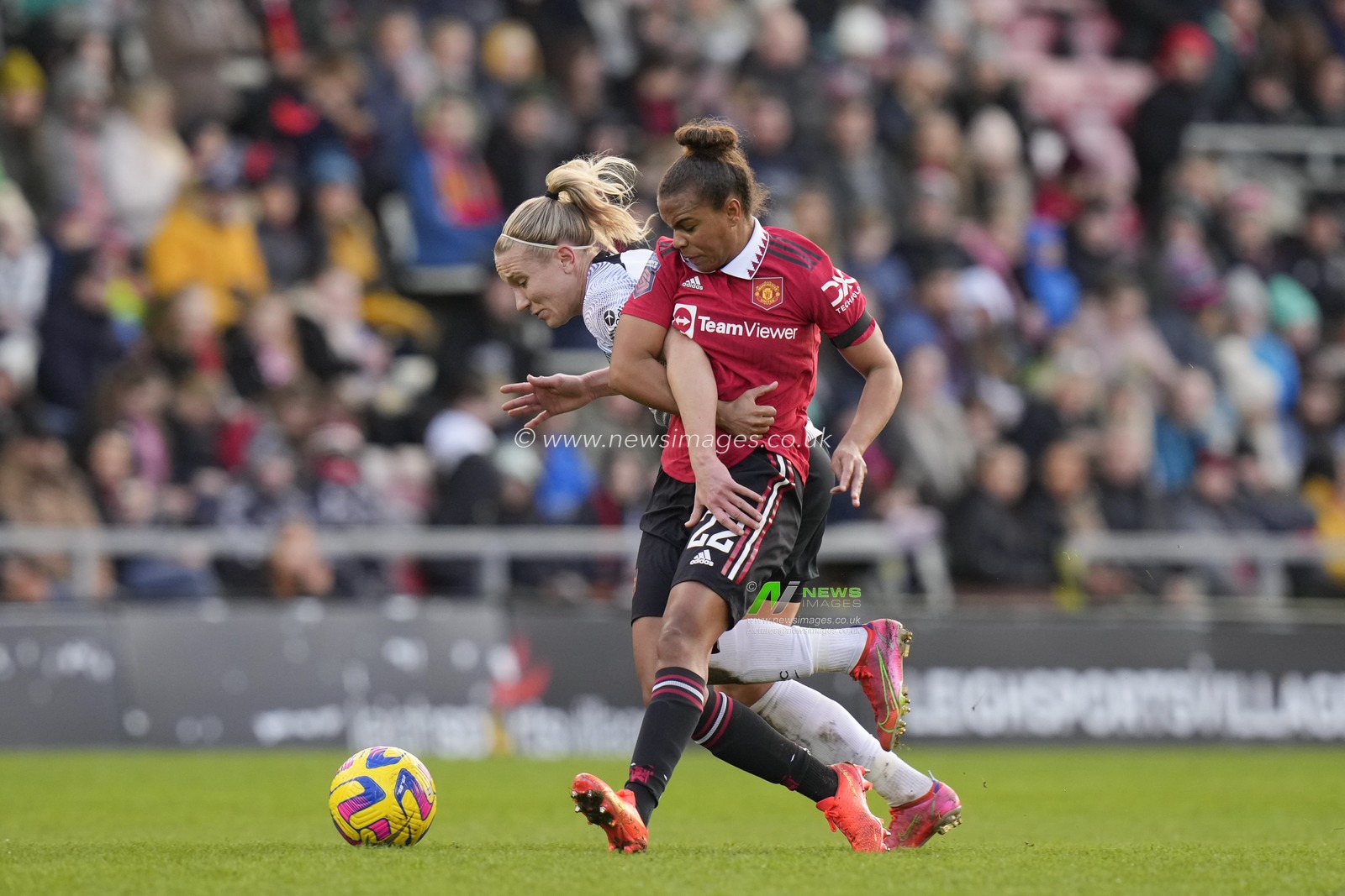Nikita Parris #22 of Manchester United competes for the ball with Emma Koivisto #2 of Liverpool Women during the The Fa Women's Super League match Manchester United Women vs Liverpool Women at Leigh Sports Village, Leigh, United Kingdom, 15th January 2023

(Photo by Steve Flynn/News Images)