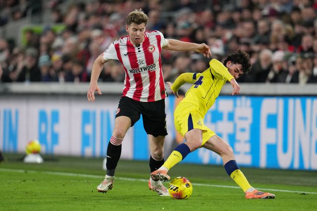 Nathan Collins of Brentford wins ball off Archie Gray of Tottenham Hotspur during the Premier League match Brentford vs Tottenham Hotspur at The Gtech Community Stadium, London, United Kingdom, 1st January 2026

(Photo by Harvey Murphy/News Images)

*** GER AUT SUI OUT ***