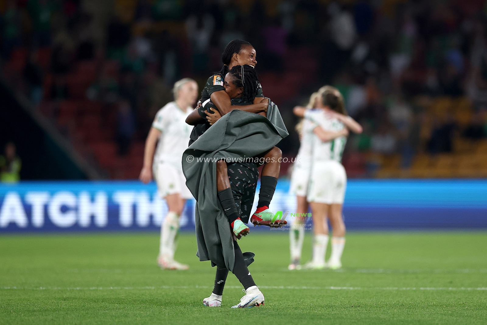 Oluwatosin Demehin of Nigeria embraces  Francisca Ordega of Nigeria after the FIFA Women's World Cup 2023 Group B  match Ireland Women vs Nigeria Women at Suncorp Stadium, Brisbane, Australia, 31st July 2023

(Photo by Patrick Hoelscher/News Images)