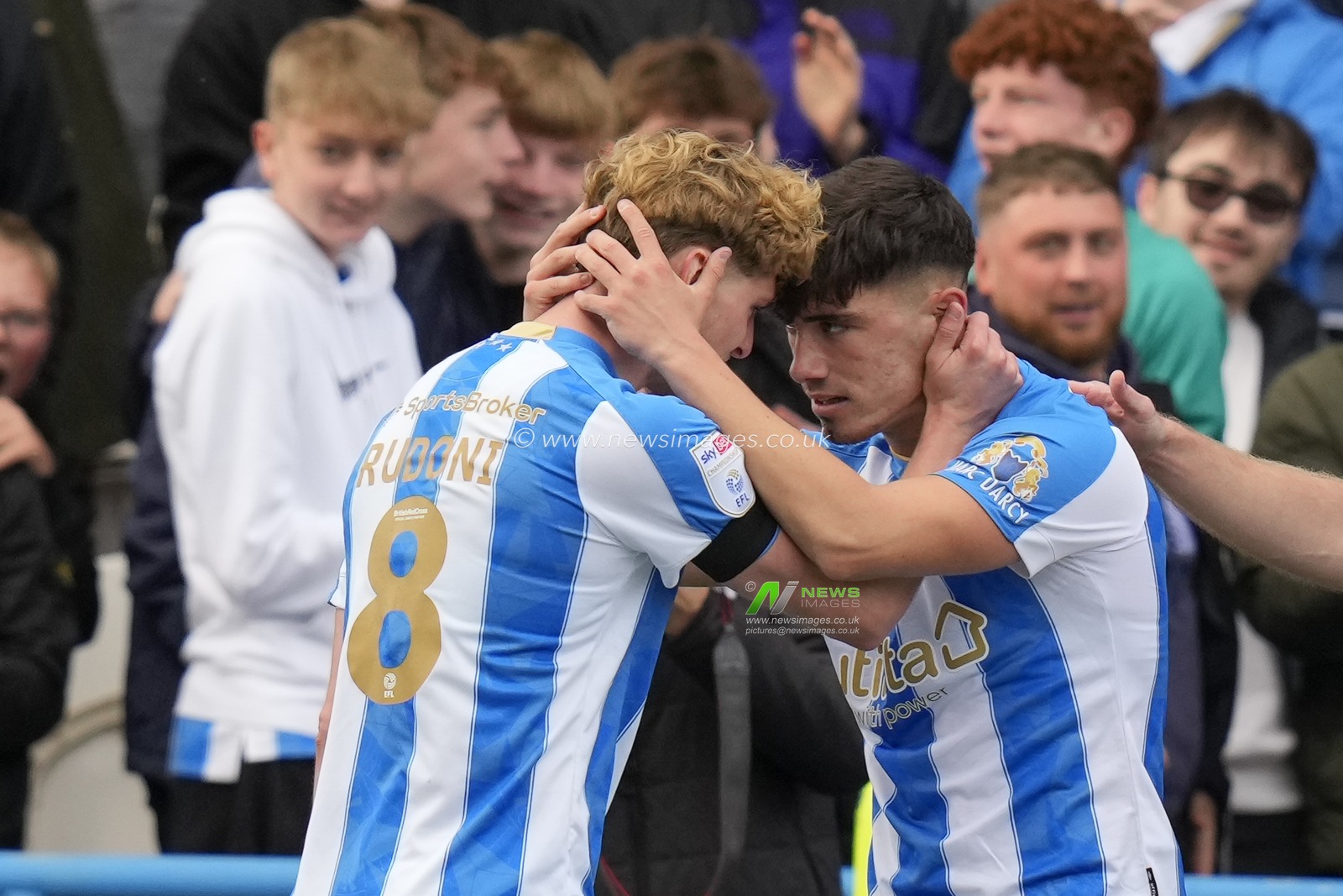 Jack Rudoni #8 of Huddersfield Town celebrates with goalscorer Kian Harratt #22 of Huddersfield Town during the Sky Bet Championship match Huddersfield Town vs Queens Park Rangers at John Smith's Stadium, Huddersfield, United Kingdom, 21st October 2023

(Photo by Steve Flynn/News Images)