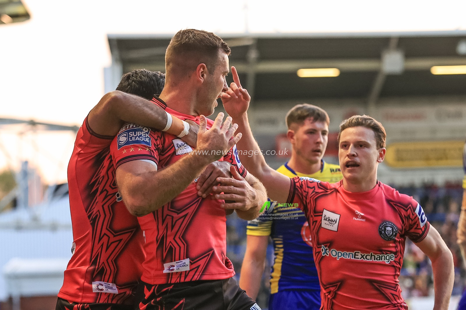 Iain Thornley #4 of Wigan Warriors celebrates his second try
