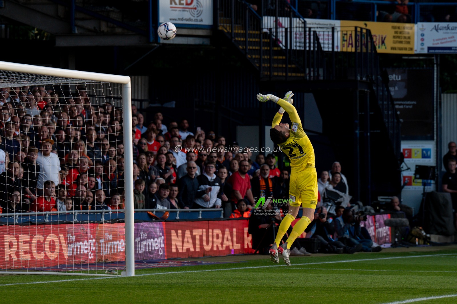Lee Nicholls #21 of Huddersfield Town makes a fine save