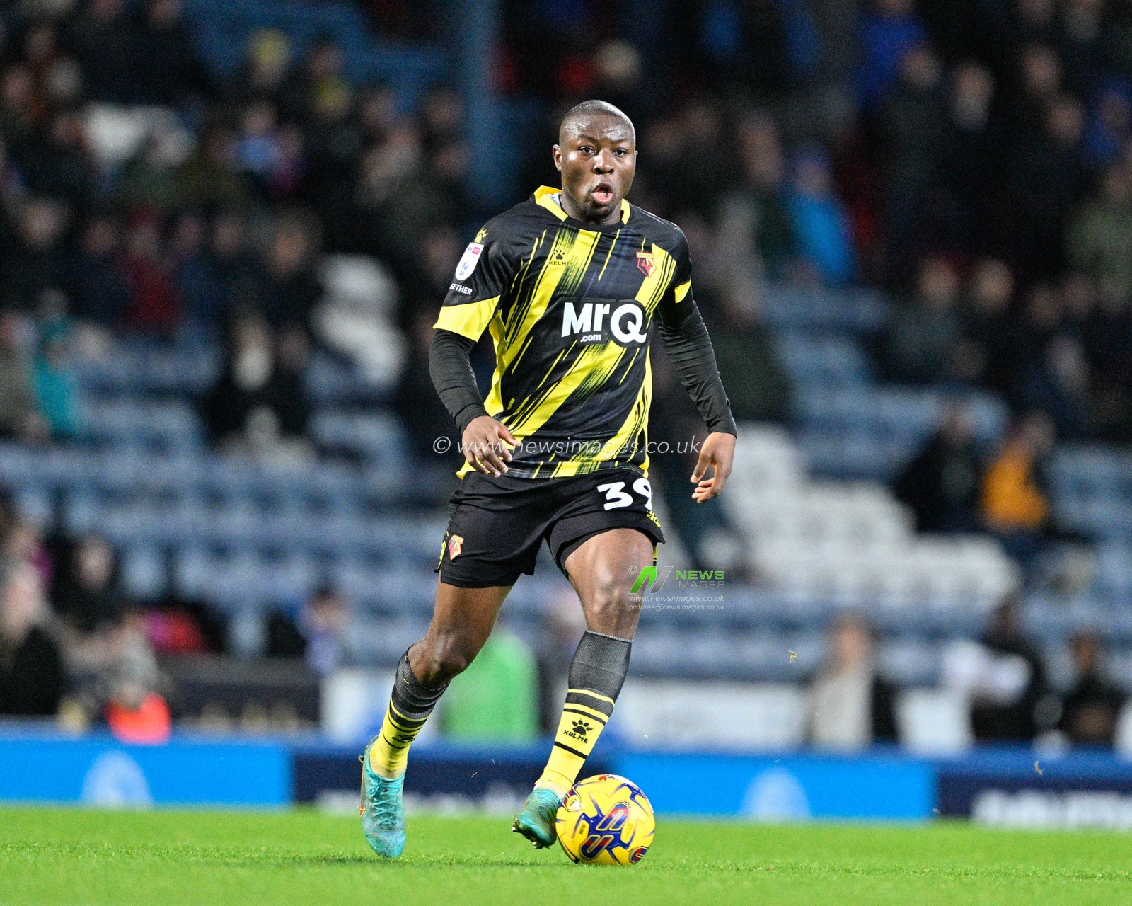 Edo Kayembe 39# of Watford Football Club breaks forward with the ball, during the Sky Bet Championship match Blackburn Rovers vs Watford at Ewood Park, Blackburn, United Kingdom, 23rd December 2023

(Photo by Cody Froggatt/News Images)