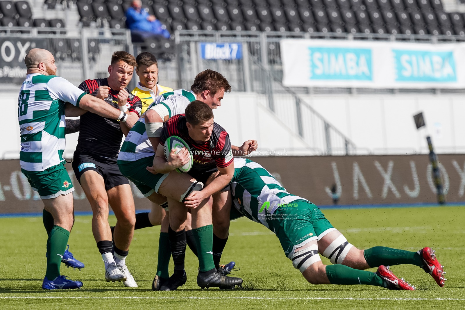 Owen Farrell #10 of Saracens in action