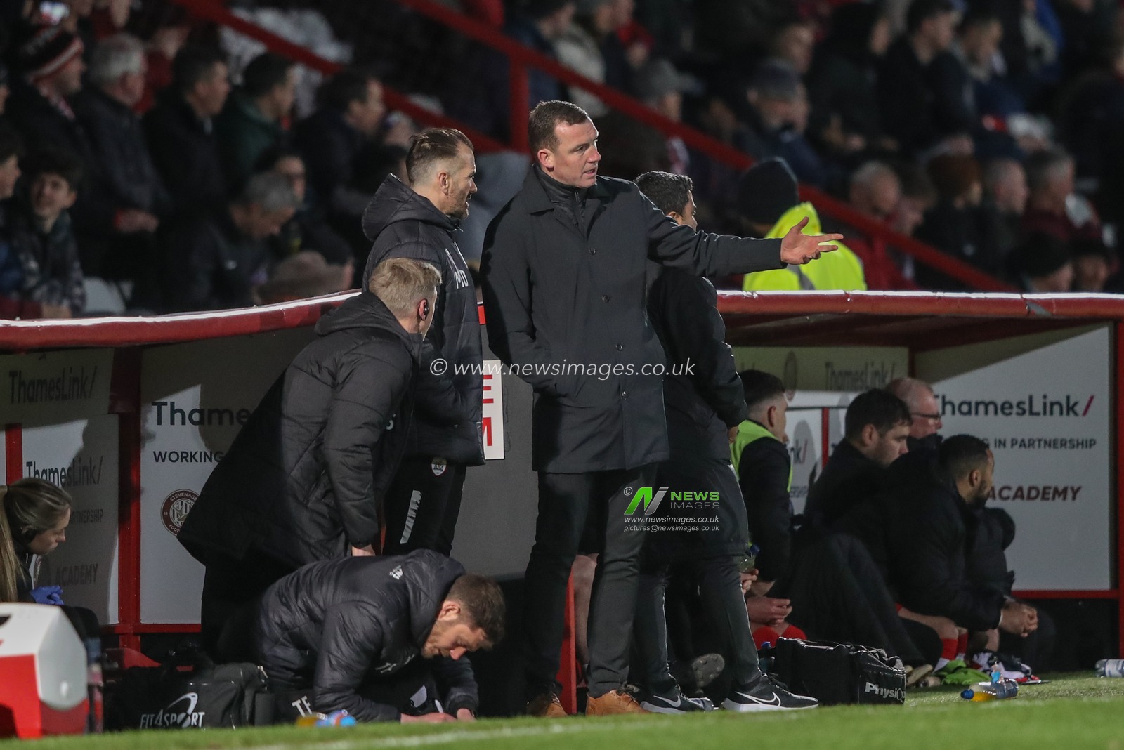 Neill Collins Head coach of Barnsley speaks to Martin Devaney first team coach of Barnsley and Jon Stead first team coach of Barnsley during the Sky Bet League 1 match Stevenage vs Barnsley at Lamex Stadium, Stevenage, United Kingdom, 9th April 2024

(Photo by Alfie Cosgrove/News Images)