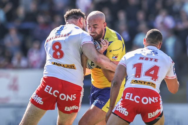 James Harrison of Warrington Wolves is tackled by Alex Walmsley of St. Helens and Moses Mbye of St. Helens during the Betfred Challenge Cup Quarter Final match Warrington Wolves vs St Helens at Halliwell Jones Stadium, Warrington, United Kingdom, 6th April 2025

(Photo by Alfie Cosgrove/News Images)