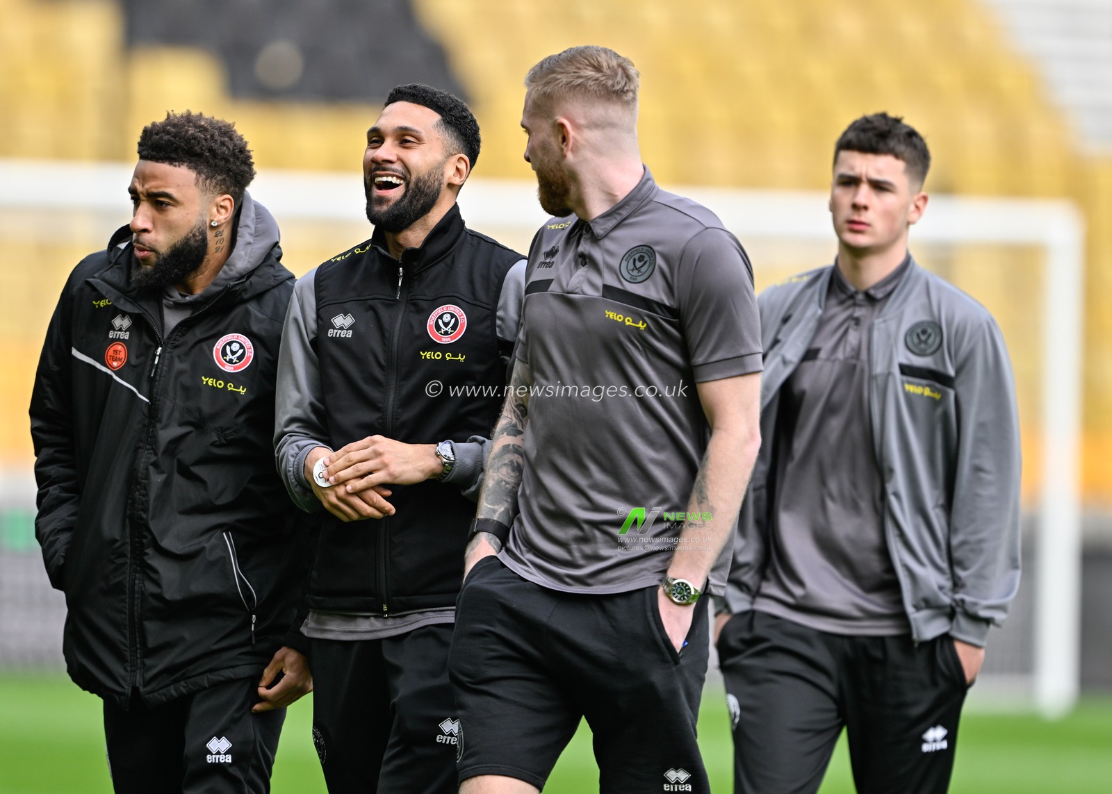 Jayden Bogle of Sheffield United shares a joke as he inspects the pitch ahead of the match, during the Premier League match Wolverhampton Wanderers vs Sheffield United at Molineux, Wolverhampton, United Kingdom, 25th February 2024

(Photo by Cody Froggatt/News Images)