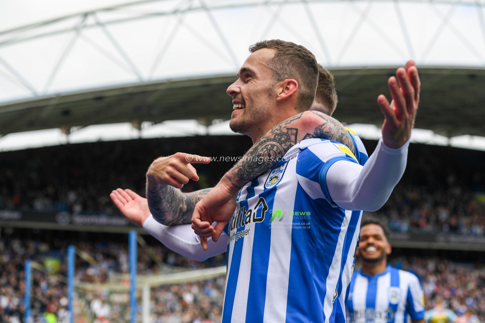 Harry Toffolo #3 of Huddersfield Town celebrates scoring a goal to make it 1-0