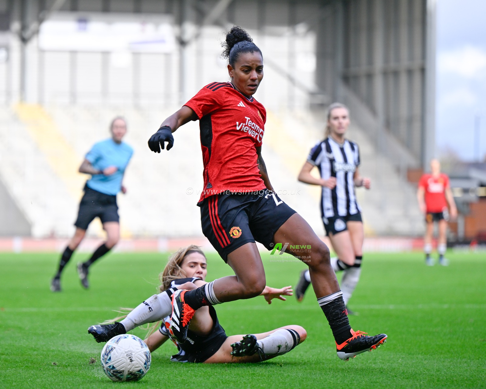 Geyse of Manchester United Women get tackled, during the Vitality Women's FA Cup match Manchester United Women vs Newcastle United women at Leigh Sports Village, Leigh, United Kingdom, 14th January 2024

(Photo by Cody Froggatt/News Images)