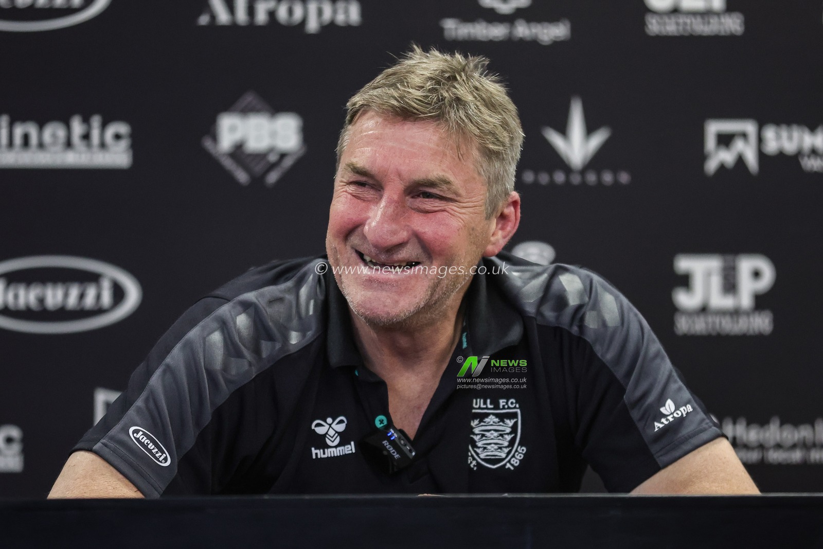 Tony Smith Head Coach of Hull FC full of laughter in the post match press conference during the Betfred Super League Round 19 match Hull FC vs Castleford Tigers at MKM Stadium, Hull, United Kingdom, 15th July 2023

(Photo by Mark Cosgrove/News Images)