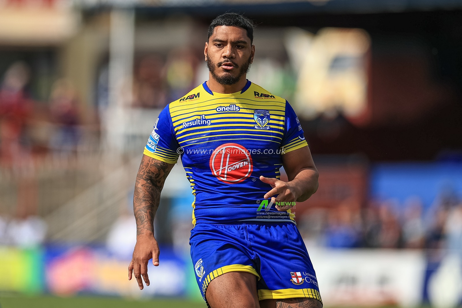 Thomas Michael #33 of Warrington Wolves makes his debut