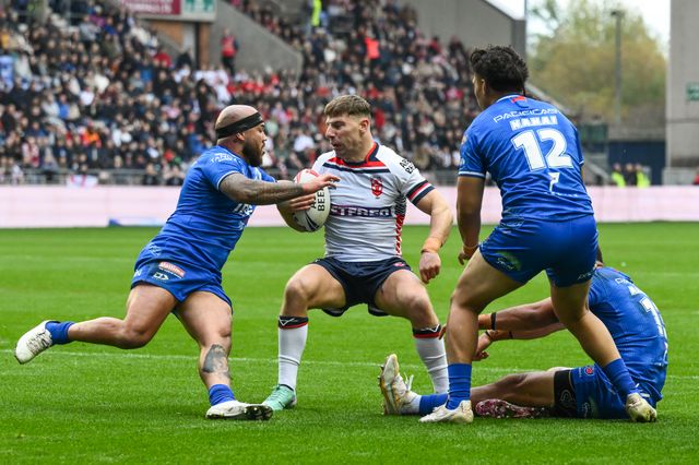 George Williams of England is tackled by Jazz Tevaga of Samoa during the ABK Beer Internationals Series match England vs Samoa at The Brick Community Stadium, Wigan, United Kingdom, 27th October 2024

(Photo by Craig Thomas/News Images)