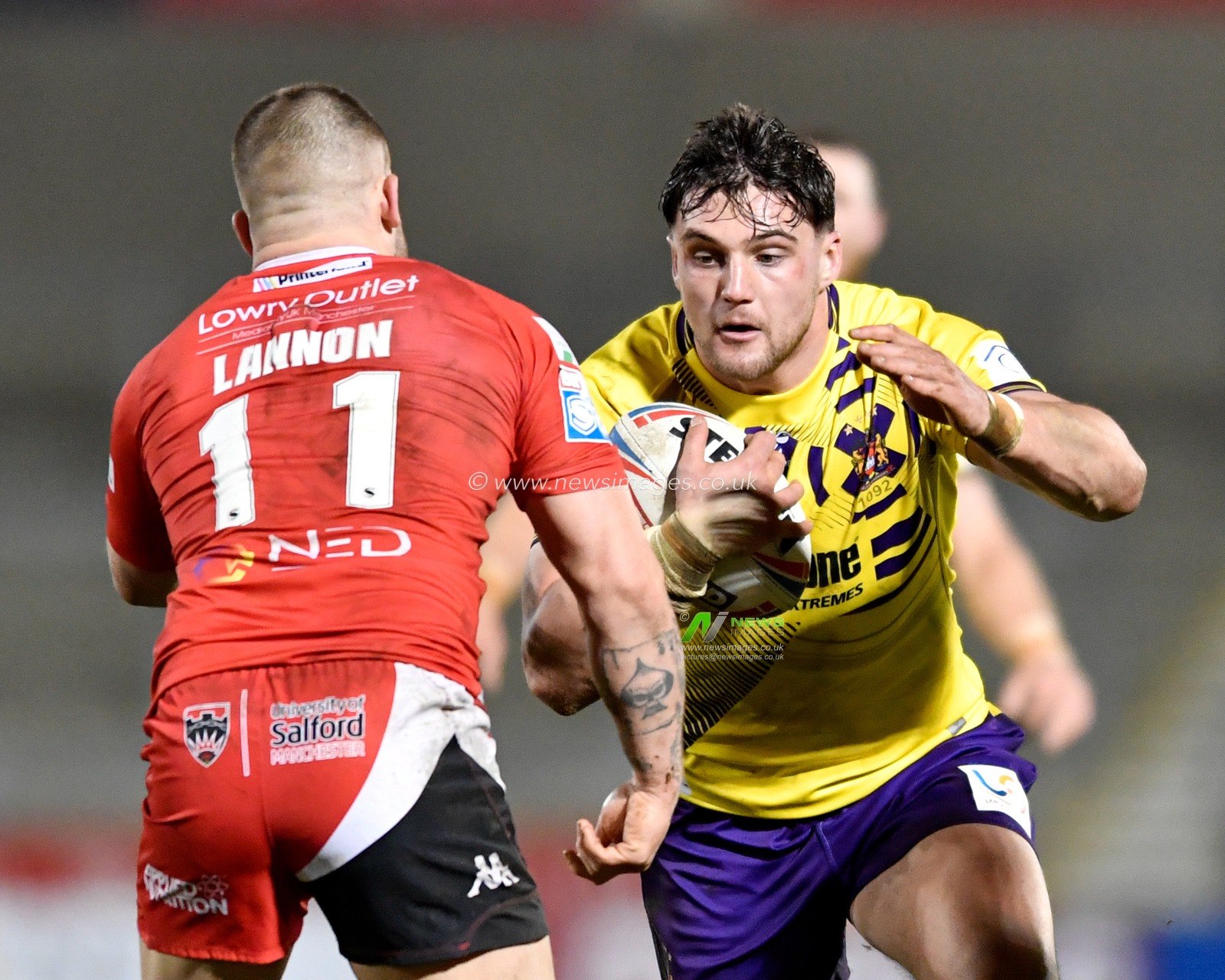 13th March 2020, AJ Bell Stadium, Eccles, England; Betfred Super League, Salford Red Devils v Wigan Warriors : Liam Byrne (20) of Wigan Warriors runs towards Ryan Lannon (11) of Salford Red Devils