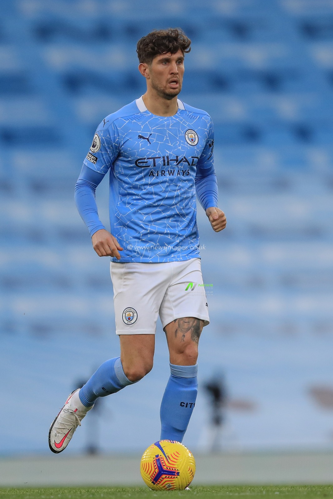 John Stones #5 of Manchester City in action during the game