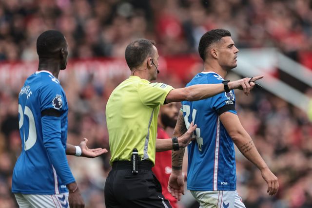 Referee Stuart Attwell sends Granit Xhaka of Sunderland off for a concussion check after refusing treatment during the Premier League match Manchester United vs Sunderland at Old Trafford, Manchester, United Kingdom, 4th October 2025

(Photo by Mark Cosgrove/News Images)